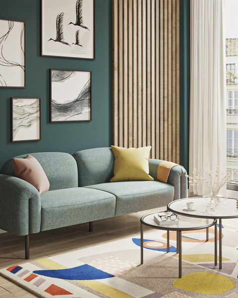 salón verde con sofá de diseño actual